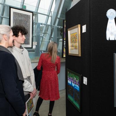 Guests peruse art gallery