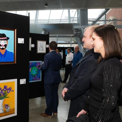 Guests peruse art gallery